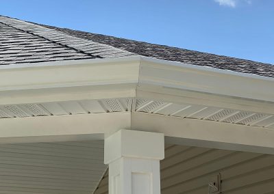 White gutters on the corner of a house