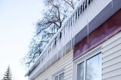 icicles hanging from rooftop and gutters heated gutters van's rain gutters